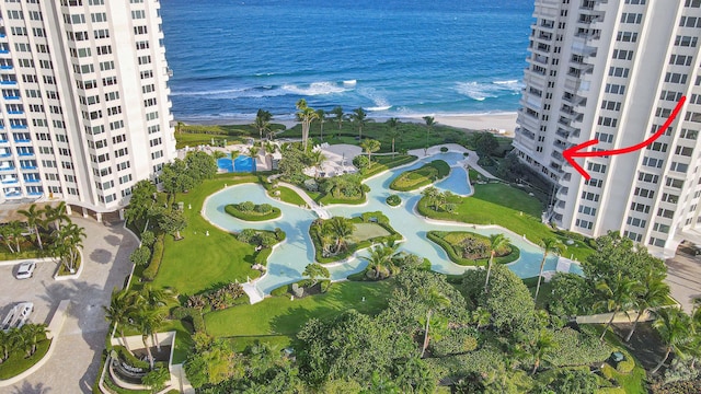 bird's eye view with a view of the beach and a water view