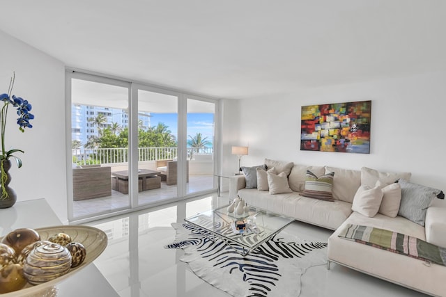 living room featuring floor to ceiling windows