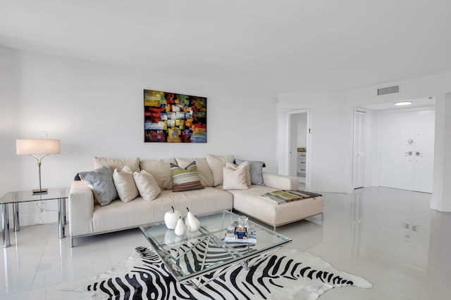 living room featuring light tile patterned floors