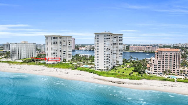 aerial view with a view of the beach and a water view