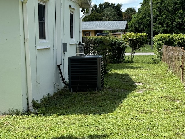 view of yard with central AC unit