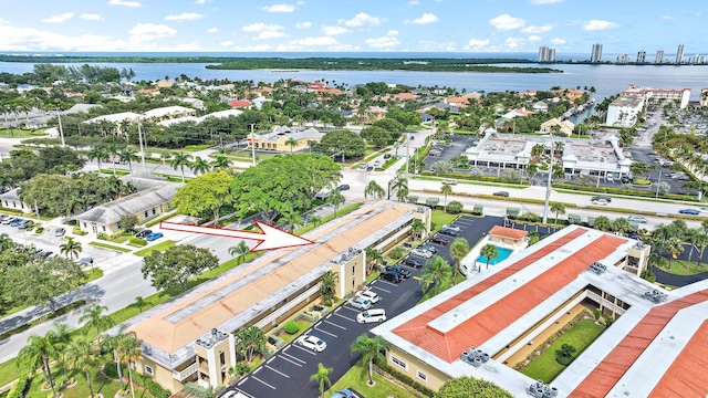 bird's eye view with a water view