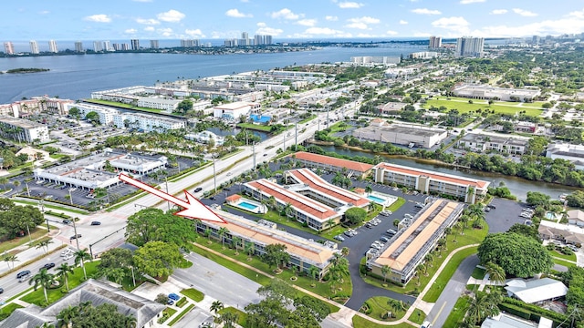 bird's eye view with a city view and a water view