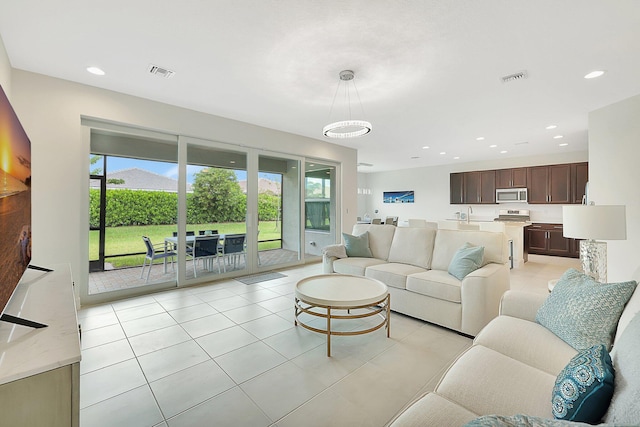 living room featuring light tile patterned floors