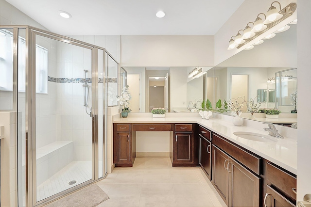 bathroom with vanity, tile patterned floors, and an enclosed shower