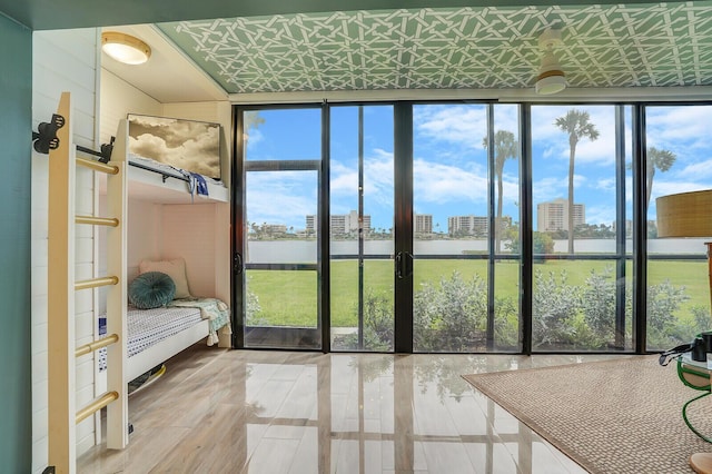 sunroom / solarium with a view of city