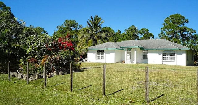 view of front of home with a front yard