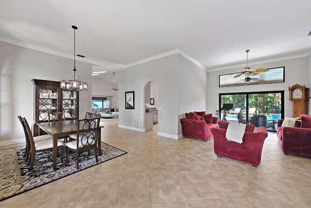 dining space featuring ornamental molding, ceiling fan, and light tile patterned floors