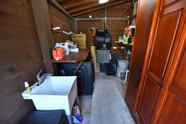 washroom with wooden walls