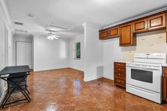 kitchen with a textured ceiling, ornamental molding, electric range, and tile patterned floors