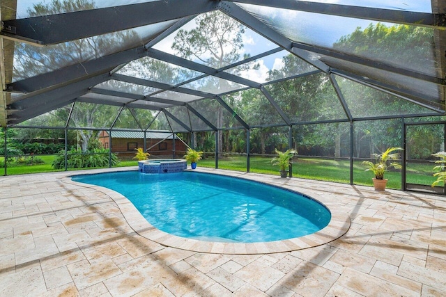 view of swimming pool with an in ground hot tub, a patio, and glass enclosure