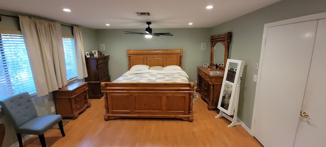 bedroom featuring ceiling fan and light wood-type flooring