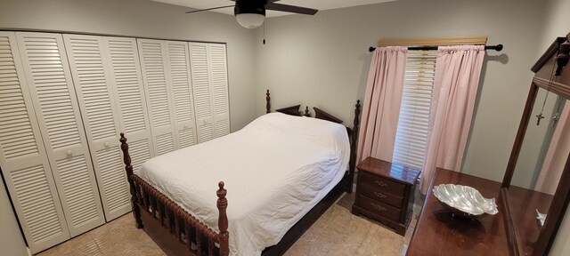 bedroom with a closet and ceiling fan