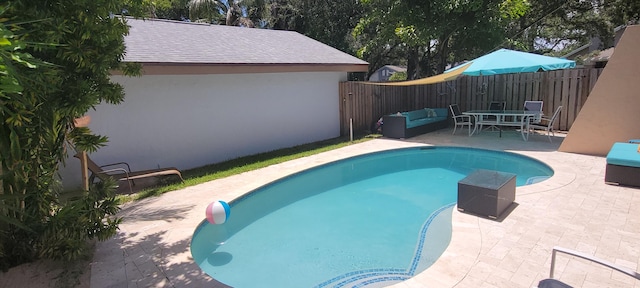 view of swimming pool featuring a patio