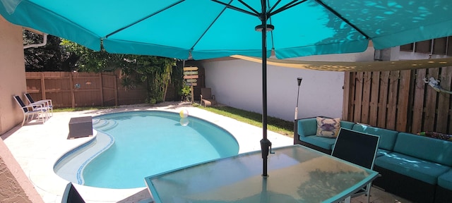 view of pool with an outdoor hangout area and a patio