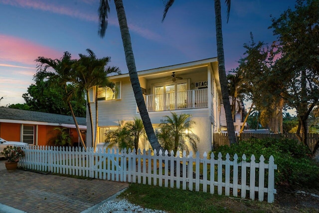 view of front of property with a balcony