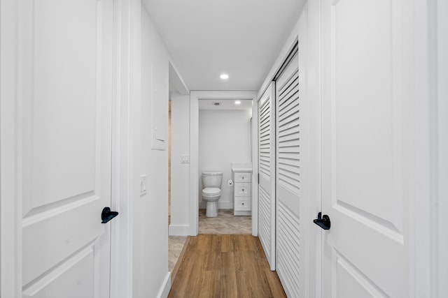 hallway featuring light wood-type flooring