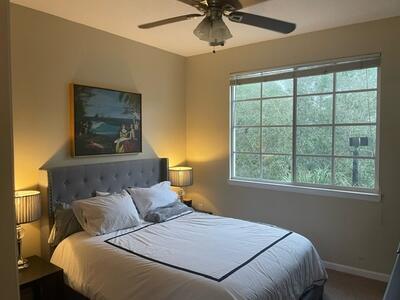 bedroom featuring ceiling fan