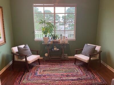 sitting room with wood-type flooring and a wealth of natural light