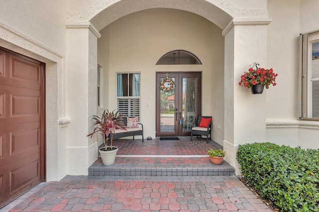 entrance to property featuring a garage