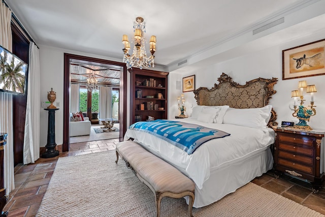 bedroom featuring a notable chandelier and ornamental molding