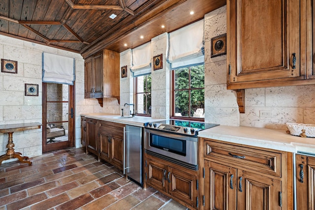 kitchen with ornamental molding, wood ceiling, sink, and electric stove