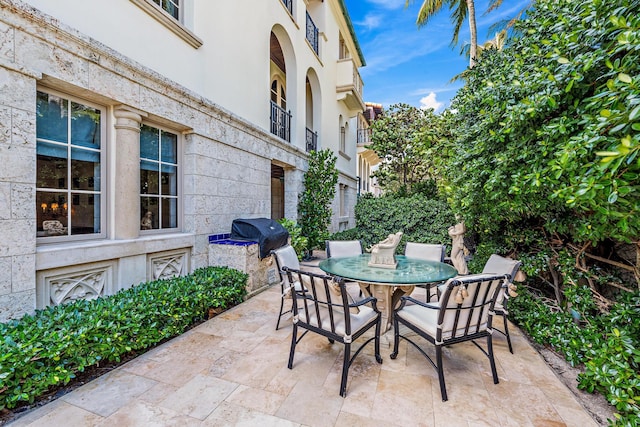 view of patio / terrace featuring a balcony