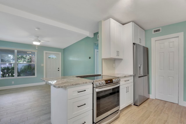 kitchen featuring ceiling fan, appliances with stainless steel finishes, light wood-type flooring, and white cabinetry