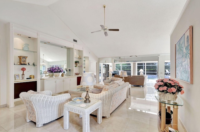 living room featuring high vaulted ceiling, built in shelves, ceiling fan, and light tile patterned floors