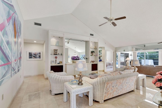 living room with ceiling fan, built in shelves, light tile patterned floors, and high vaulted ceiling