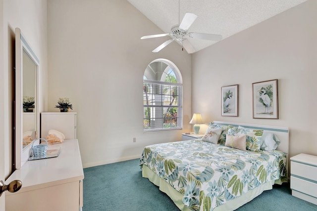 carpeted bedroom featuring a textured ceiling, ceiling fan, and high vaulted ceiling