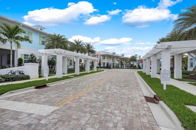 view of home's community with a pergola