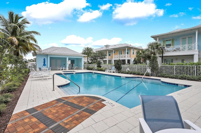 view of pool featuring a patio