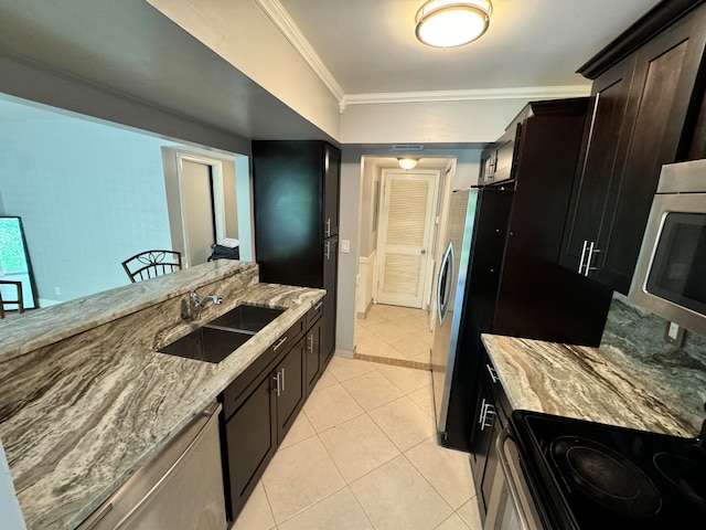 kitchen with light tile patterned flooring, sink, appliances with stainless steel finishes, crown molding, and light stone countertops