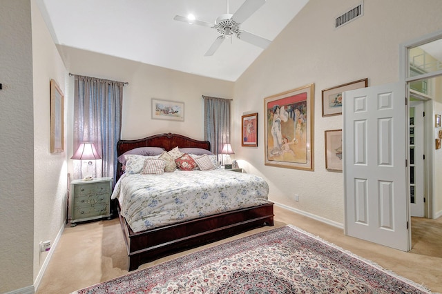 carpeted bedroom with high vaulted ceiling and ceiling fan