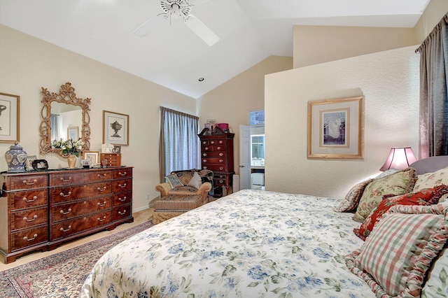 bedroom featuring a ceiling fan, carpet, and vaulted ceiling