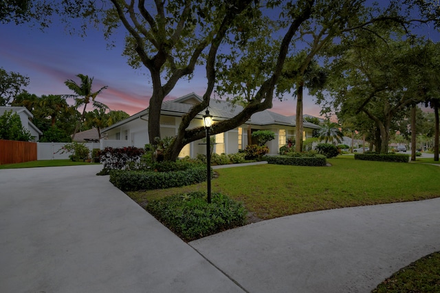 view of front of home featuring a yard