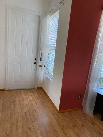 entryway with light wood-type flooring