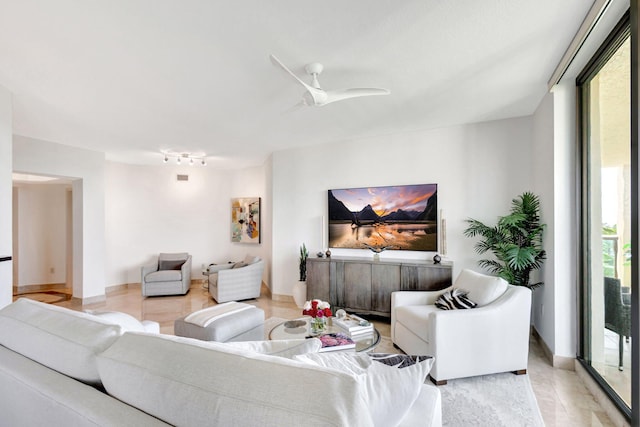 living room with ceiling fan