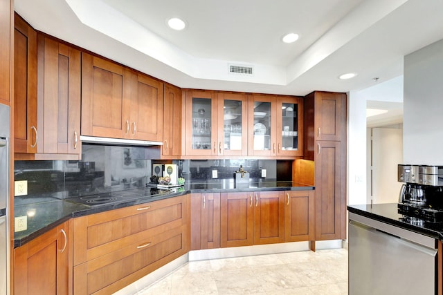 kitchen with backsplash, extractor fan, dishwasher, a tray ceiling, and black electric cooktop