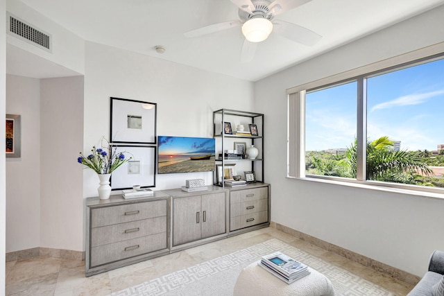 living room featuring ceiling fan