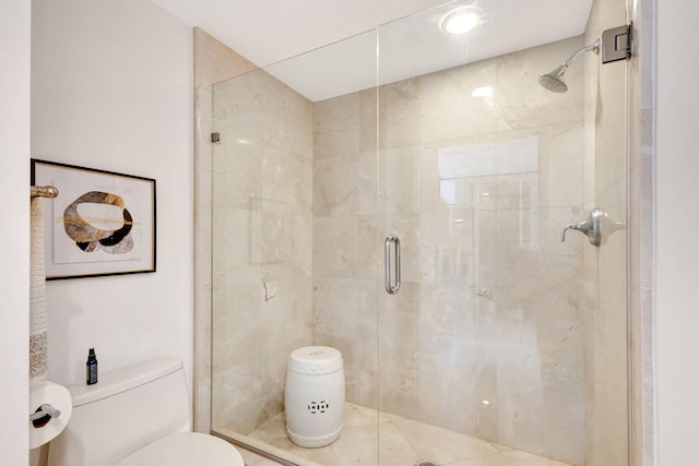 bathroom with toilet, tile patterned floors, and walk in shower