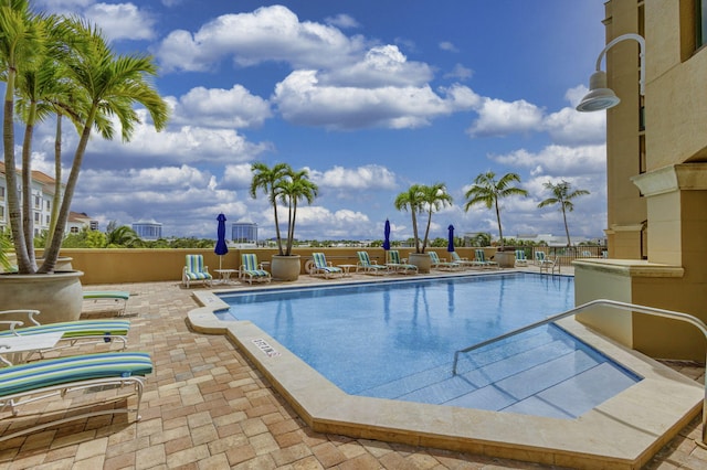 view of swimming pool featuring a patio