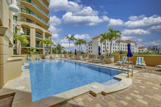 view of pool featuring a patio