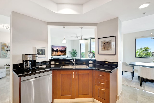 kitchen with hanging light fixtures, sink, and dishwasher