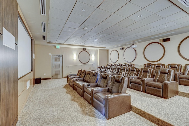 cinema featuring a paneled ceiling