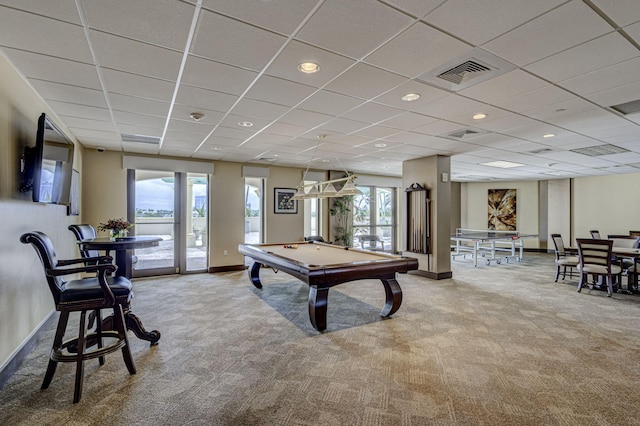 game room featuring a paneled ceiling, billiards, and carpet