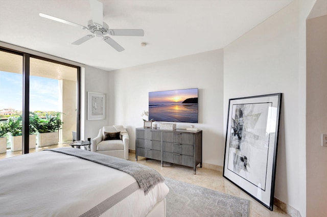 bedroom featuring ceiling fan and access to exterior