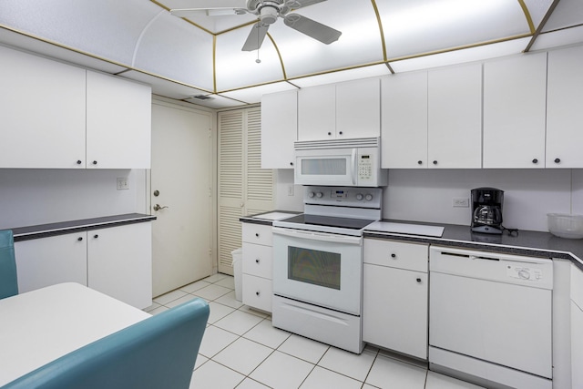 kitchen featuring white appliances, ceiling fan, and white cabinets