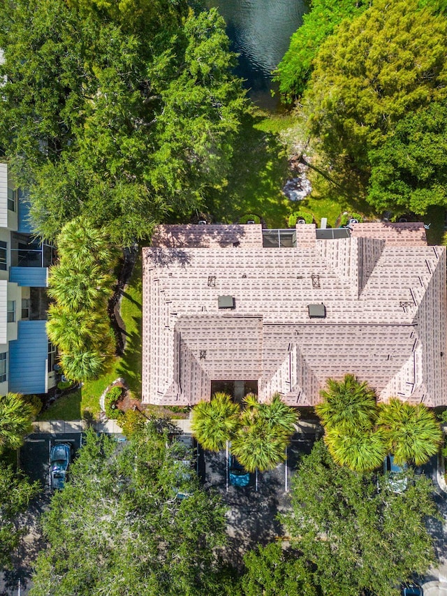 drone / aerial view with a water view